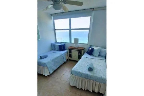 شقة Luxury Beachfront Condo With Pool And Beachview Balcony سان خوان